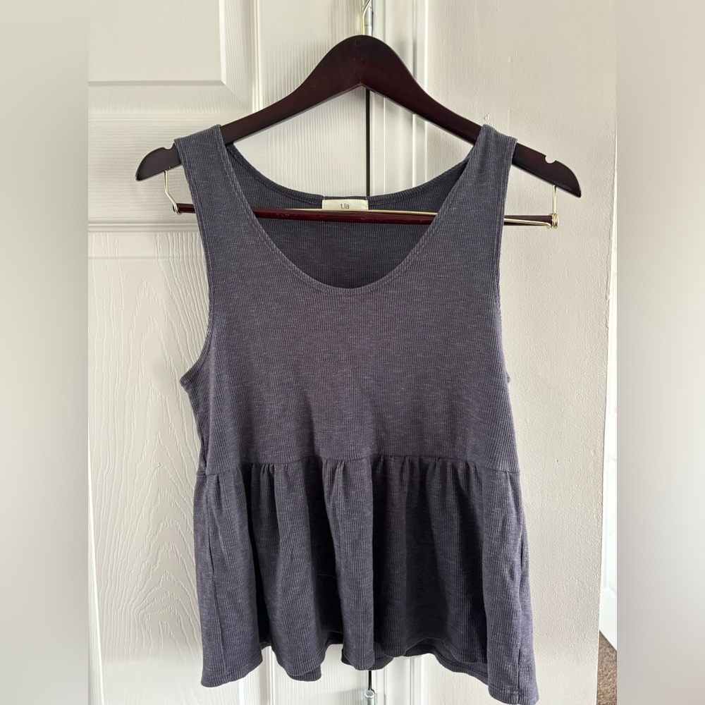 T. la Babydoll Peplum Top by Anthro